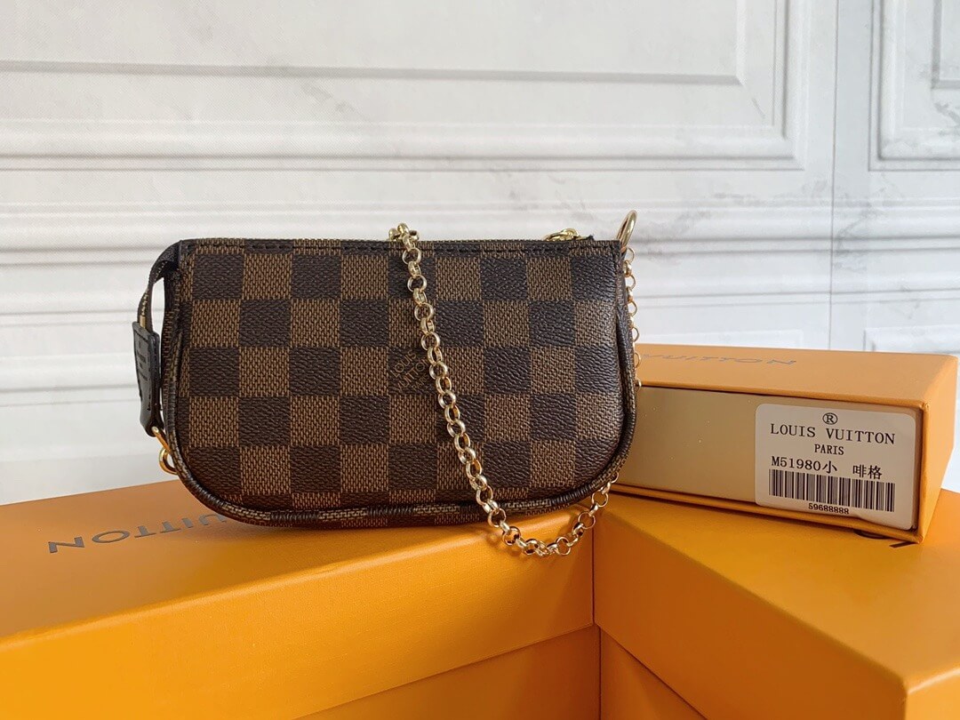 Louis Vuitton LV Damier Ebene canvas Mini Pochette Accessoires Wallet Handbag N58009 Brown
